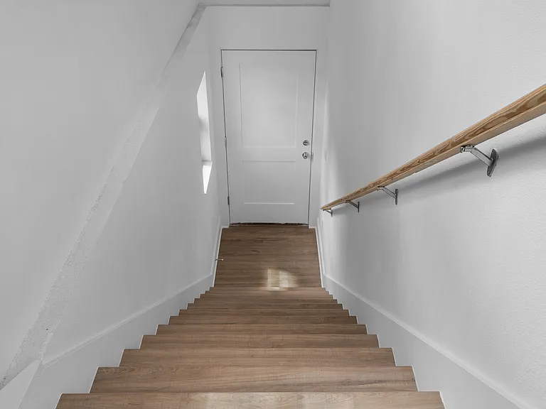Stairs leading down to the units front door