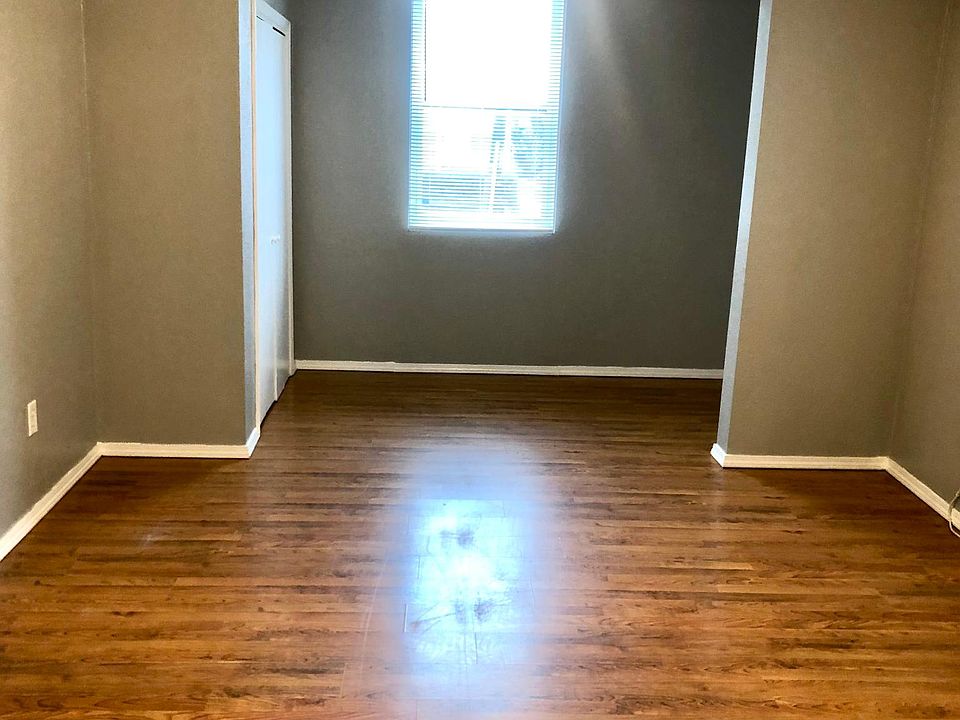 Large Master Bedroom. Front window facing street.