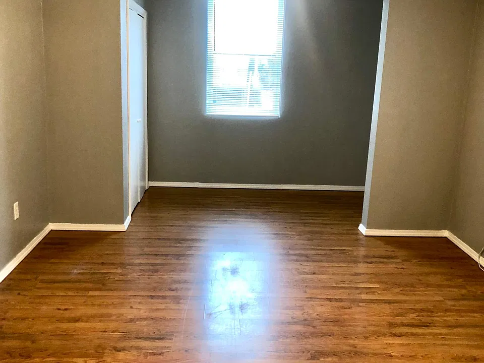 Large Master Bedroom. Front window facing street.