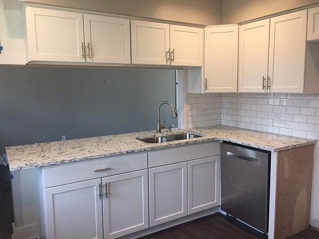Kitchen with Subway tile backsplash and SS Appliances
