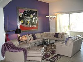 Spacious Living Room with water feature view