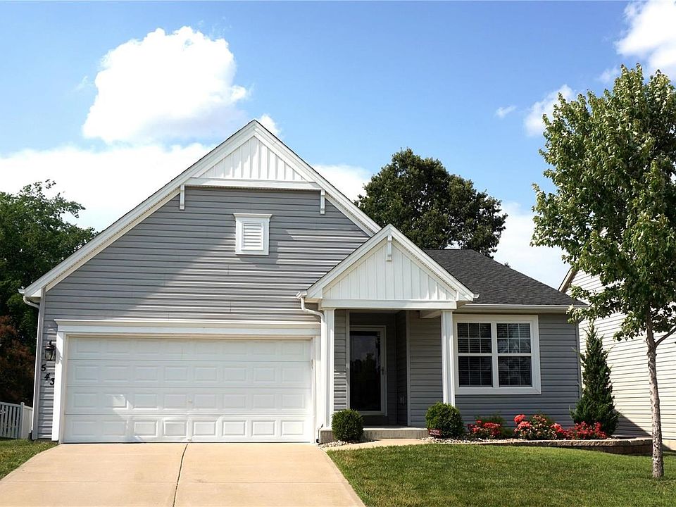 Fresh & inviting exterior bids you welcome to 543 Mira Villa! You will love the friendly Bella Vista Community in St. Peters!