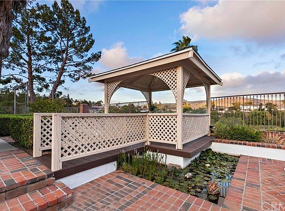 Stunning views from every angle of the property. Beautiful gazebo with Koi pond.