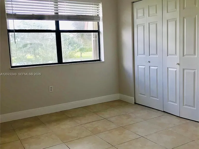 565 NW 100th Pl #203 — Photo 9
