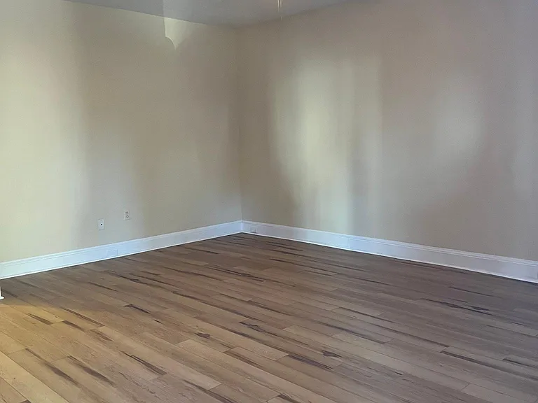 Large living room from perspective of 
Front door entry