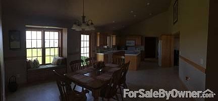 Lower Family Room
						:
						Large family room with gas fireplace. French doors to walkout.
