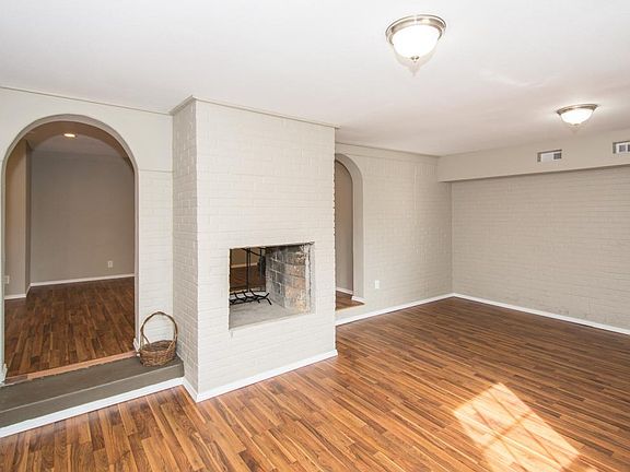 The step down family room is designed with comfort in mind.