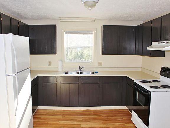 Photo is of a similar unit with the same kitchen layout.