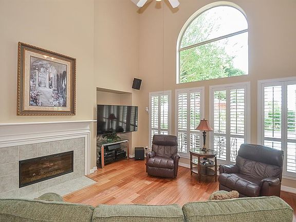 Gas log fireplace and niche to accommodate your furnishings. Beautiful hardwood floors.