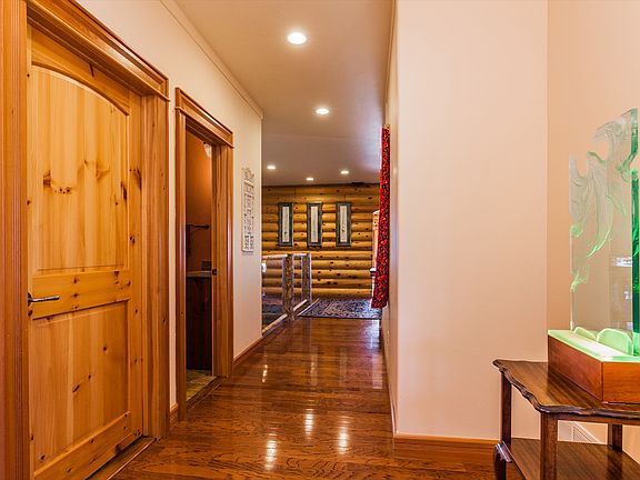 Hallway with hardwood floors