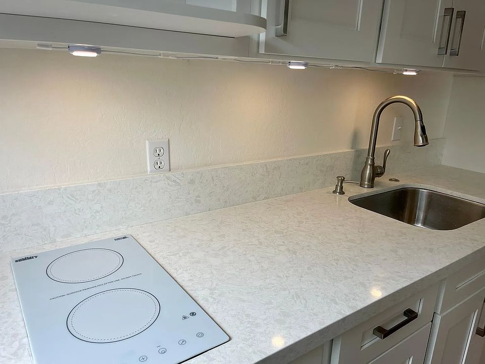 New kitchen cabinets, quartz countertop, new appliances