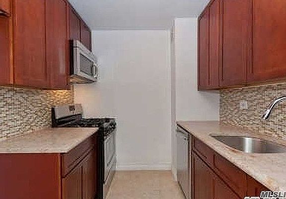 4th image of 65-50 Wetherole St #F