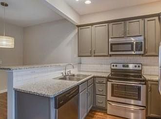 Kitchen with Granite and Stainless Steel Appliances