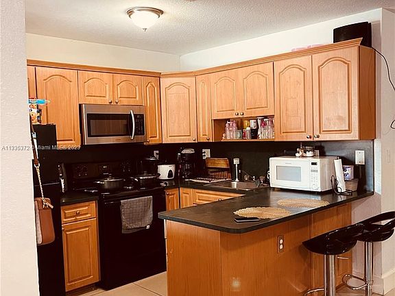 5th image of 5857 Nw 13 Avenue