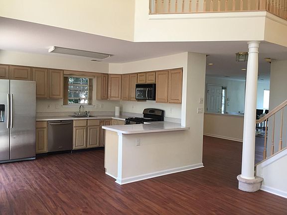 Kitchen with Stainless Steel finished Refrigerator,  Dish Wa
