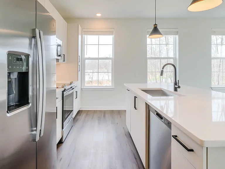 Kitchen with Stainless Steel Appliances and Light Cabinets