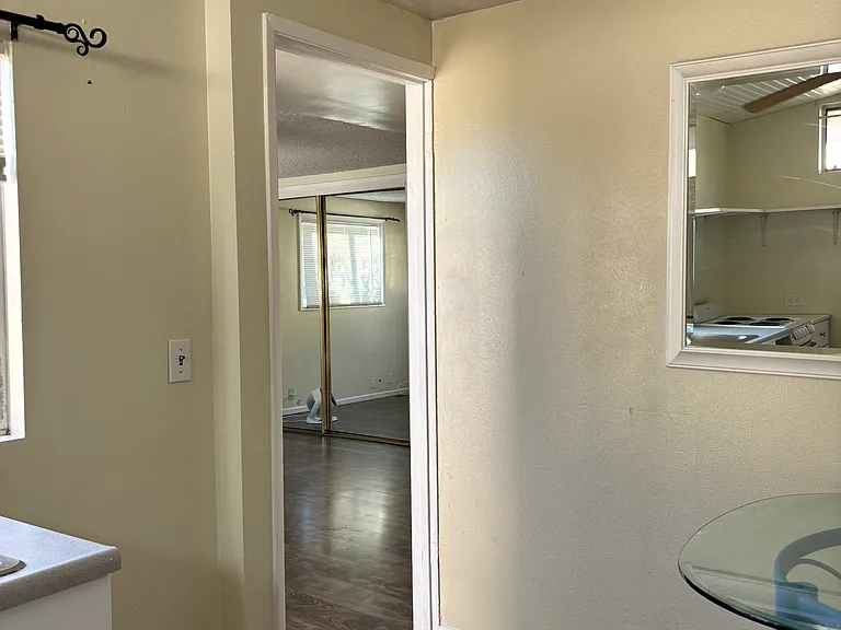 View from kitchen to living room, or bedroom