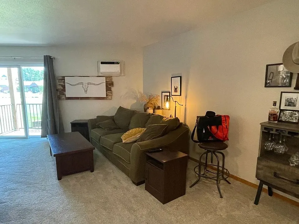 Step into comfort at LS Capital Group, where modern living meets cozy elegance. This inviting living area features stylish decor and ample natural light, perfect for relaxation. Don't miss outa"schedule your tour today!