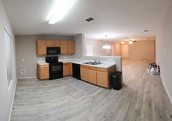 View from Rear Entry looking into the Kitchen