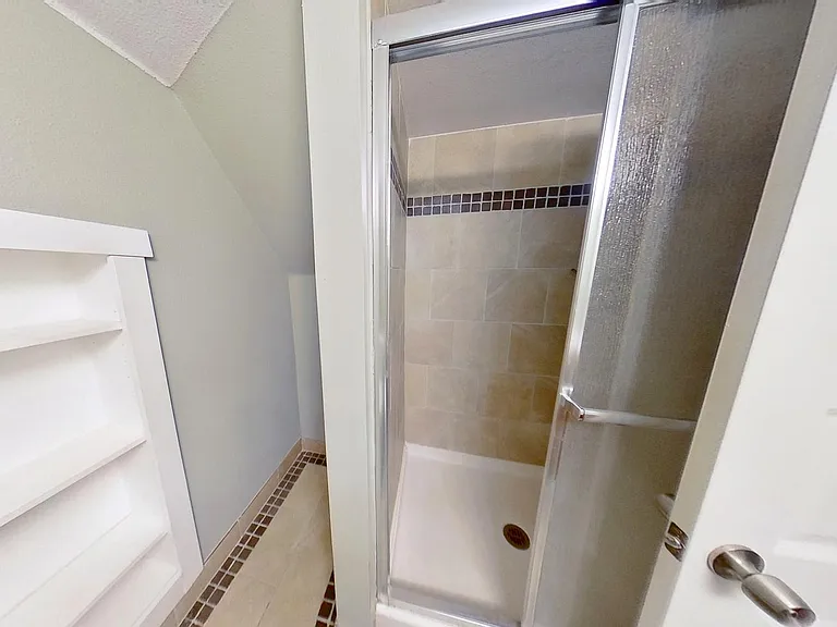 Bathroom next to Bedroom 5 on the lower level.