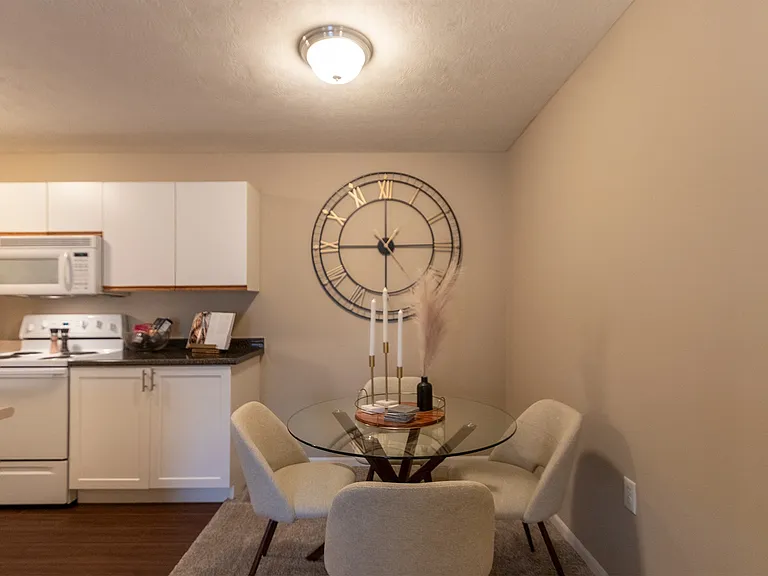 Our model Liberty kitchen features both upgraded cabinetry with dark countertops and classic cabinetry with light countertops.