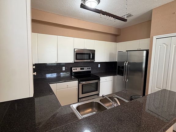 4th image of 130 Jacaranda Country Club Dr APT 207