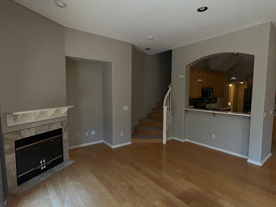 Living room with gas fireplace.