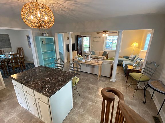 Bright kitchen, open concept to living room and dining room