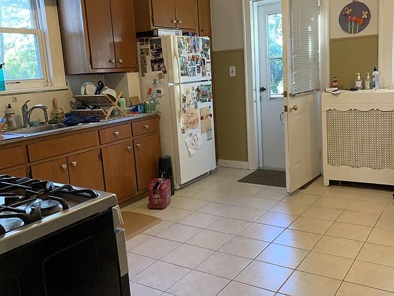 ANOTHER VIEW OF THE EXPANSIVE KITCHEN