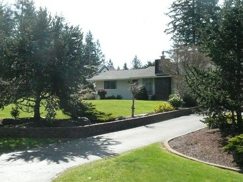 Rambler is the main house with forced air heat and AC. Both Homes have new roofs, multiple skylights
