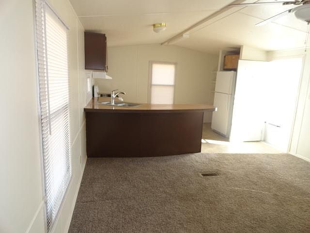 living room looking into kitchen