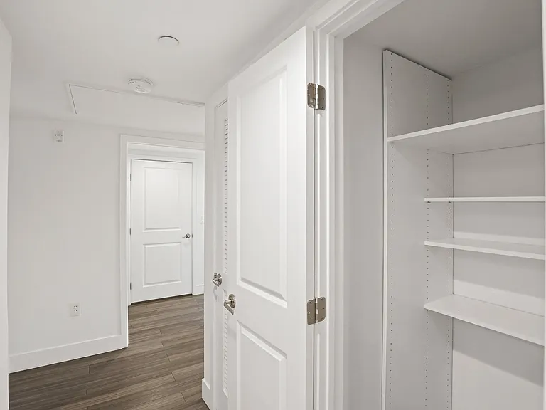 Hallway Storage Closet with Shelving