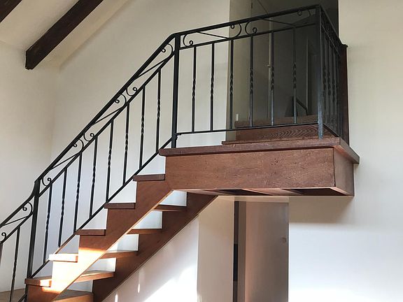 Unique look to stairs to 2 bedrooms a full bathroom and 2 storage closets. Each bedroom has a closet