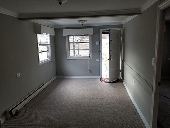 View of front room from kitchen area.