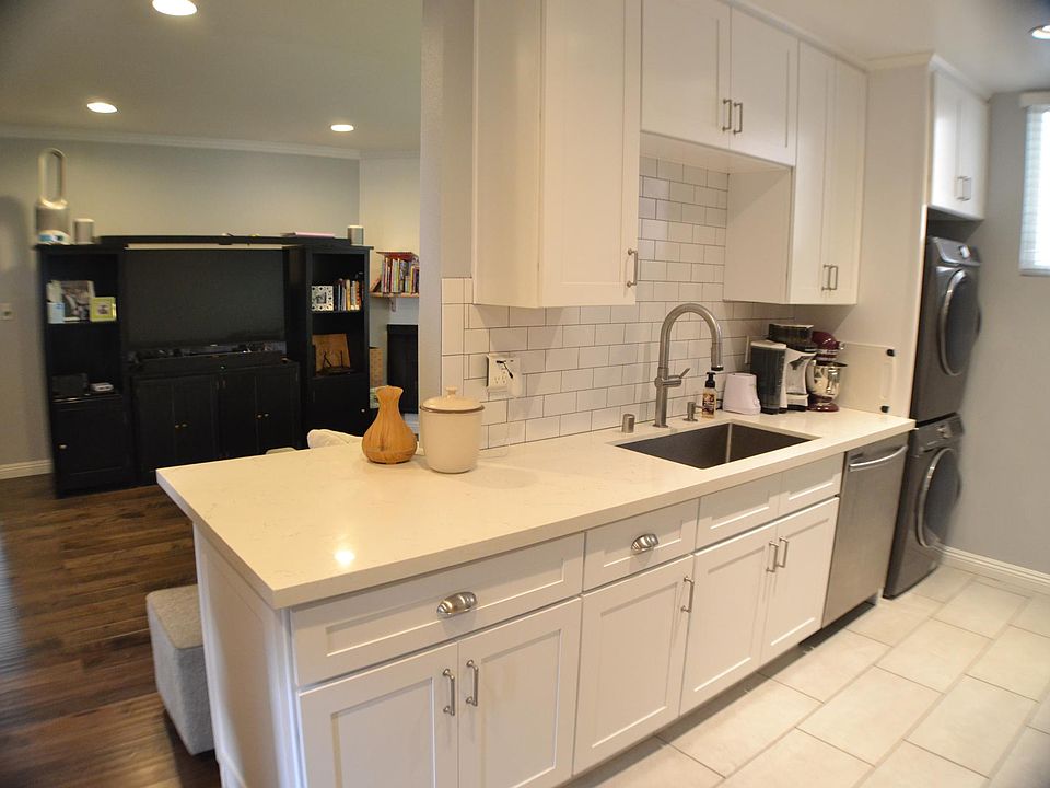 Kitchen with Plenty of Cabinet Storage. Subway Tile Gives a Modern Touch!