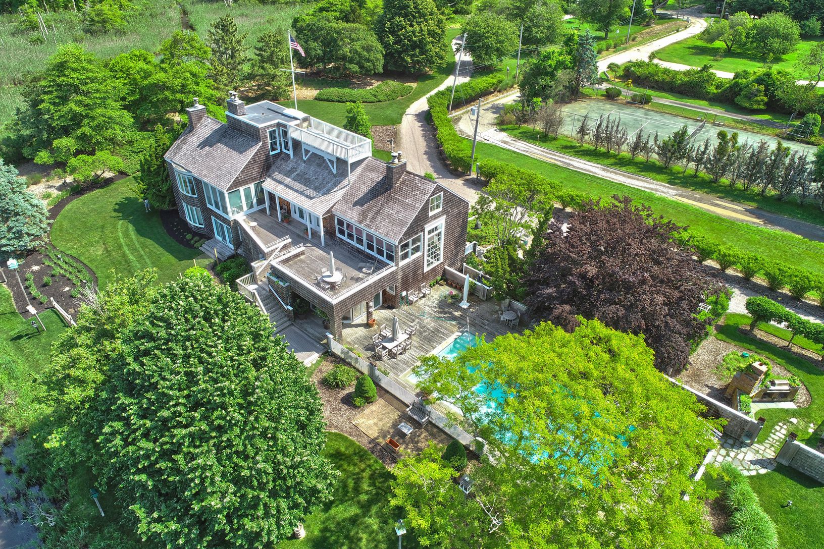  Lush Landscape with Specimen Trees & Multiple Gardens