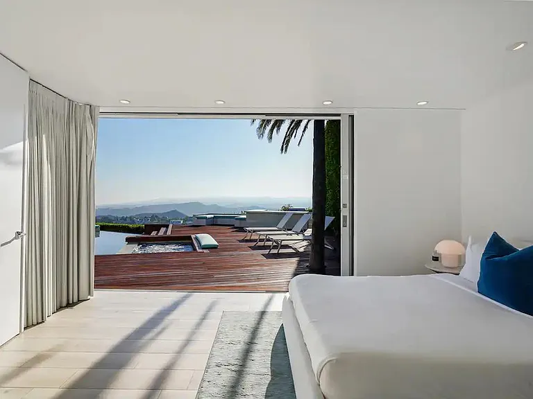 Experience restful sleep with blackout curtains for a serene ambiance.
