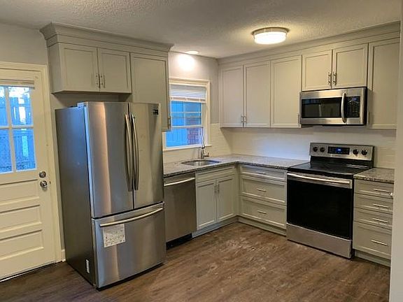 Kitchen - All new cabinets with stainless steal appliances.