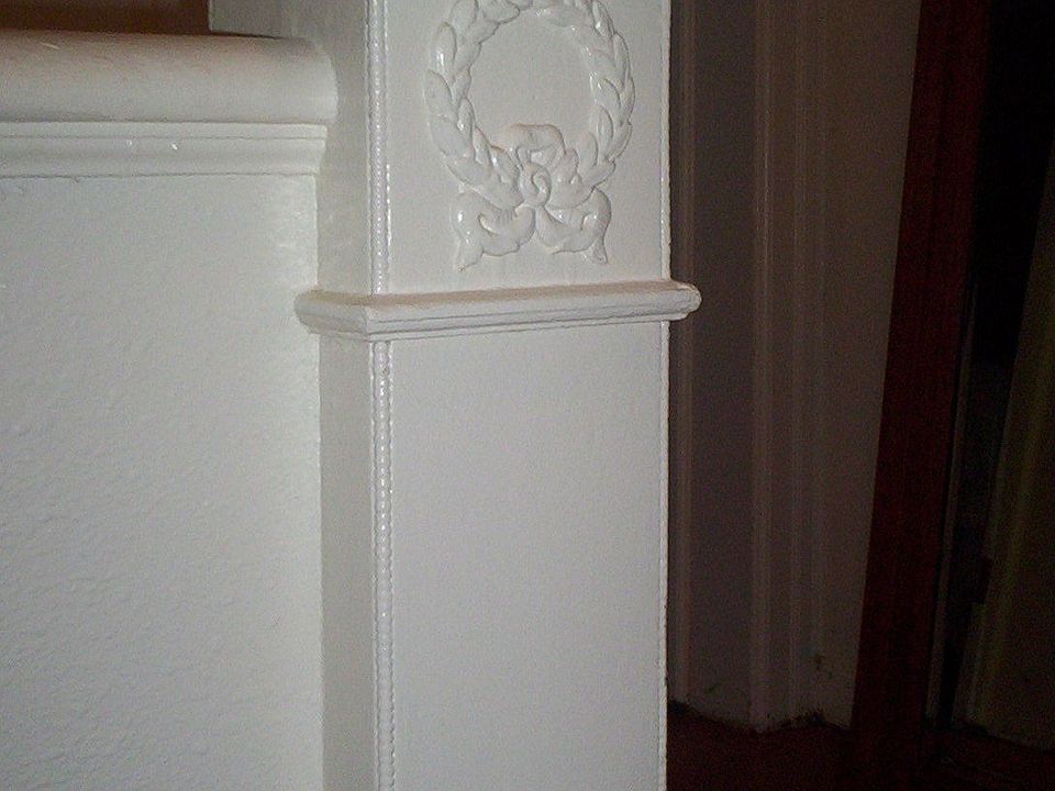 An old world touch at the top of the stairs