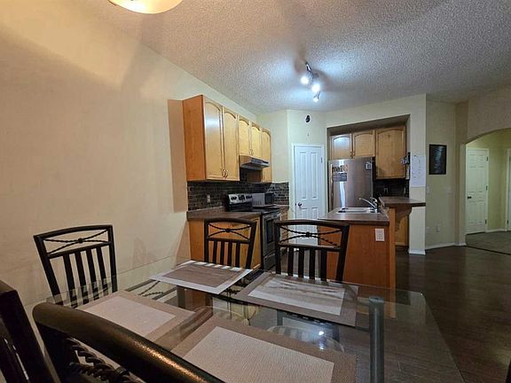 5th image of 13 E Tuscany Ridge Mews NW