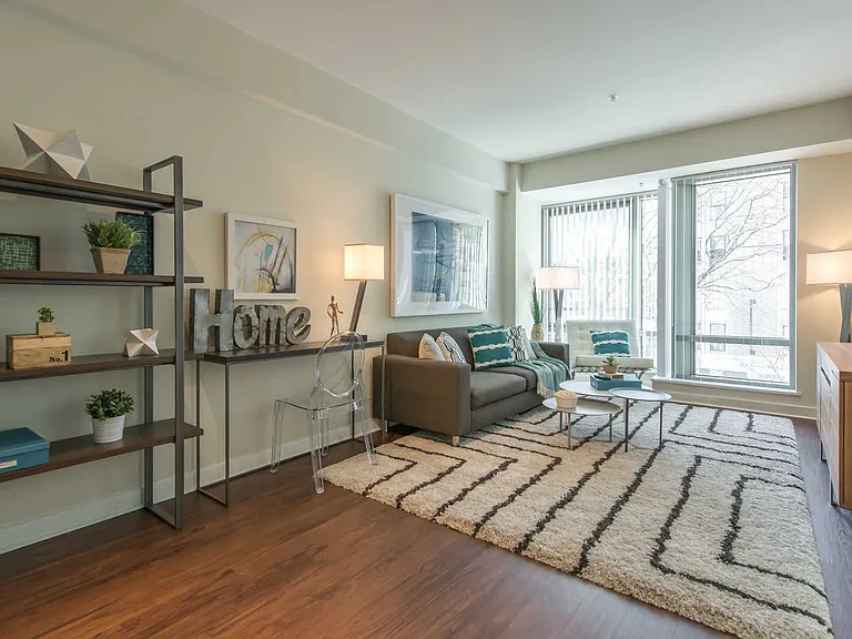 Asteria Living Room with Hard Surface Flooring and Floor-to-Ceiling Windows