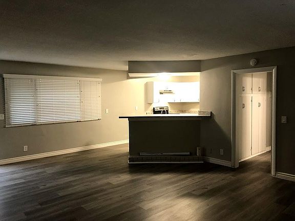 Large windows throughout with 2-1/2 inch cordless mini blinds.