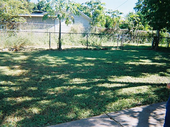 Large Backyard with mature Pecan Tree