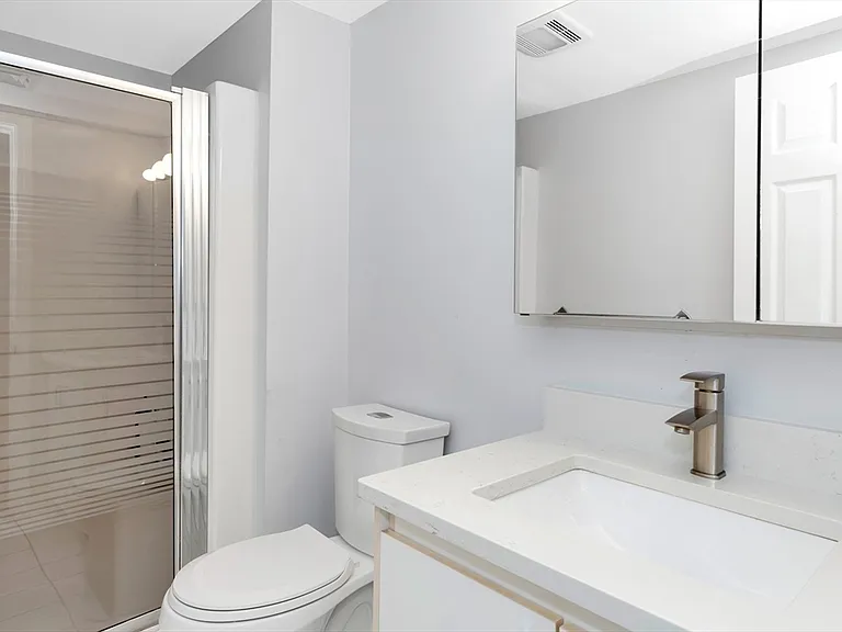Shared Bathroom attached to living room