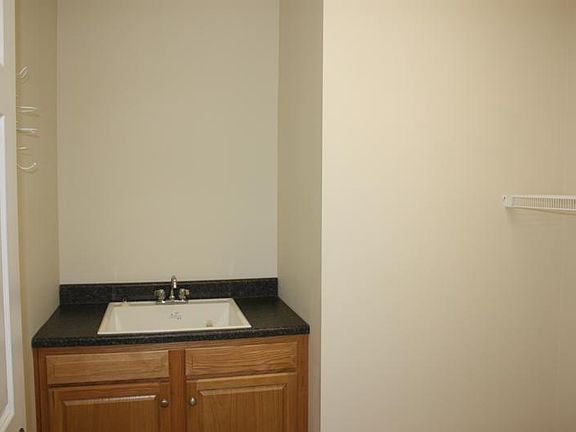 Laundry Room, sink only, no washer/dryer.