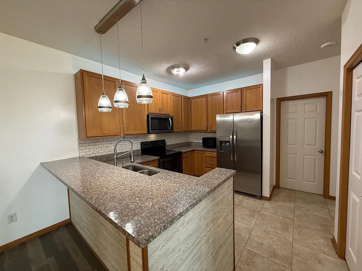 Modern 3 Bed Ramsey Townhome with Attached 2-Car Garage — Photo 4