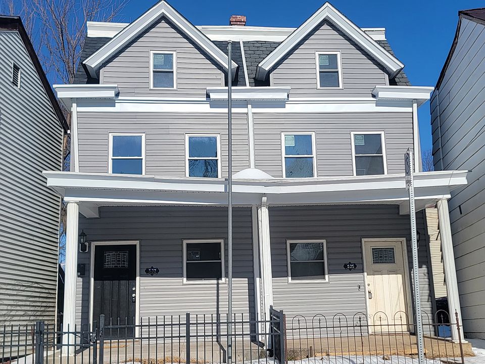 House on the left with the black door