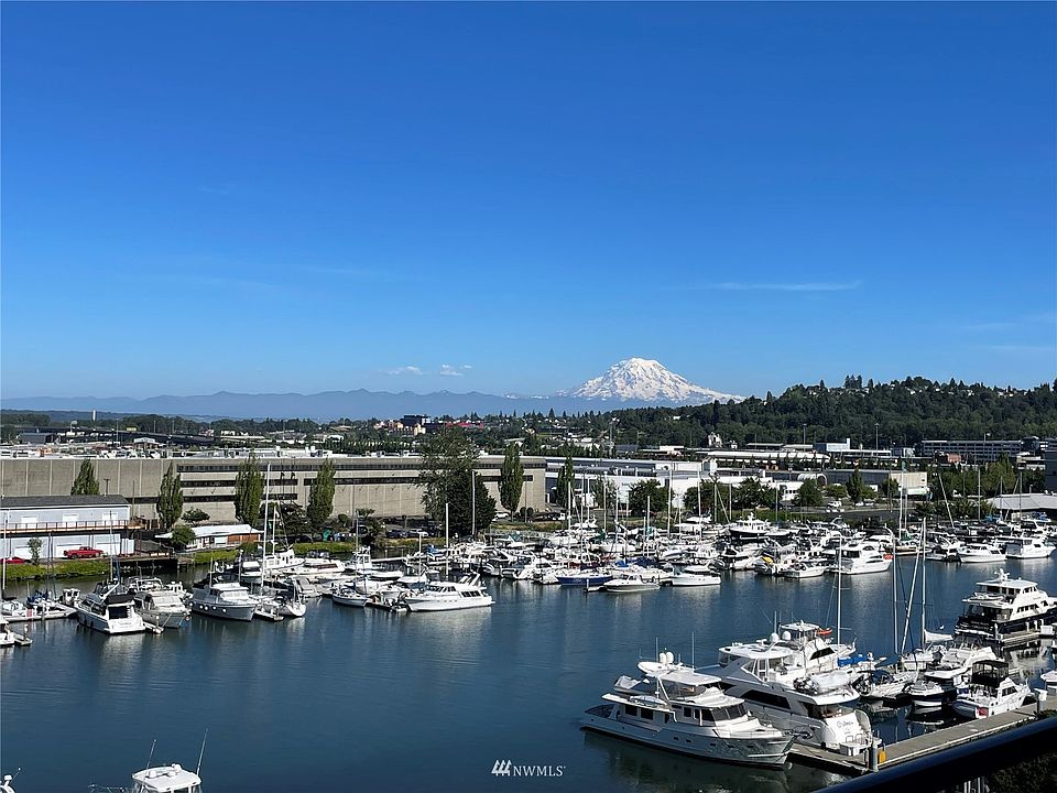 Iconic Mt. Rainier reigns supreme from this incredible, waterfront, Esplanade home. An active Waterfront, Cascade Mountains, Commencement Bay, fiireworks, moonscapes, sunrises, all within reach from your waterside vantage point at the Esplanade.>