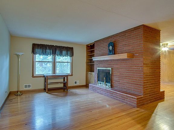 dining, formal livingroom, built ins with fireplace 11 x 17