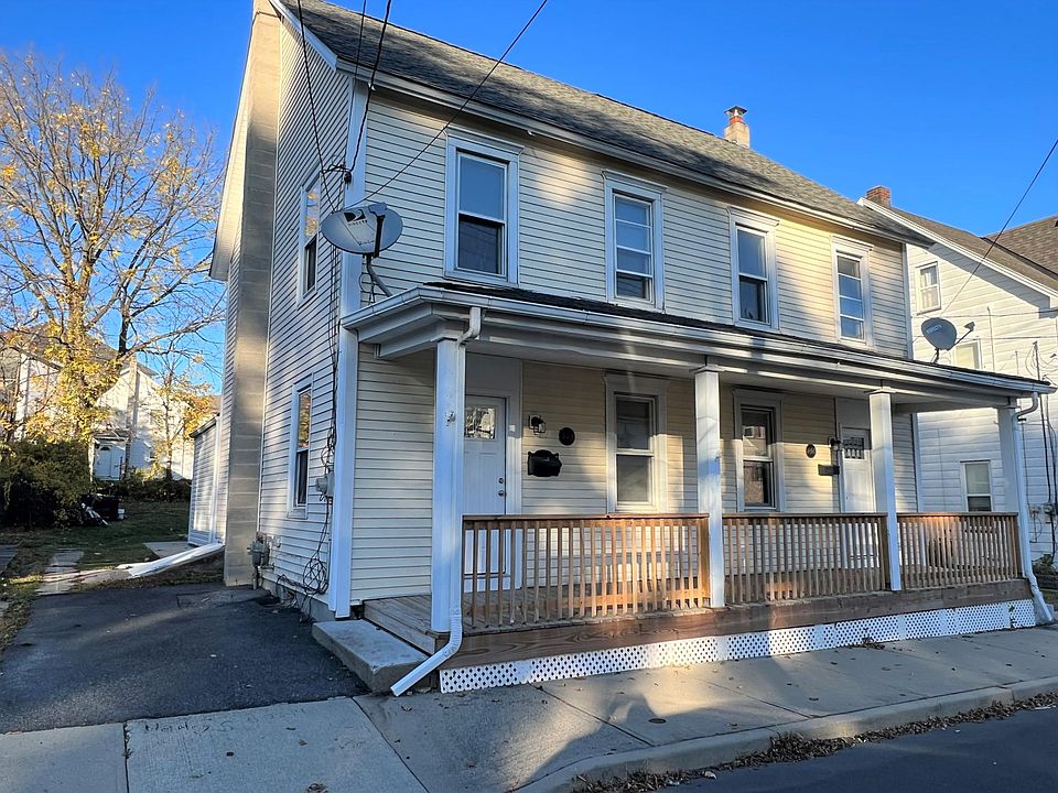 Front of unit with 1 one parking space available